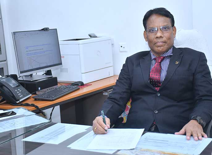 Dr Lalit Minj